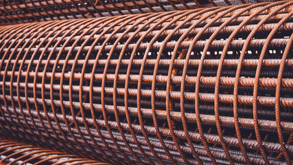 . Iron Bundle for making reinforcement concrete . rebar for reinforce hole in the ground. Texture background net metal red
