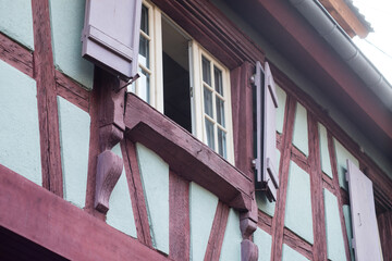 Wall Mural - retail of typical architecture of medieval house in alsatian village in France