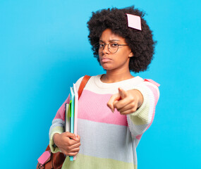 Wall Mural - young pretty afro student woman