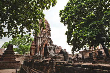 AYUTTHAYA, THAILAND - MAY 25, 2018: Ayutthaya Historical Park in Ayutthaya (second capital of the Siamese Kingdom). A very popular destination for day trips from Bangkok. Wat Mahathat Temple.