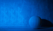 Volleyball Ball Isolated On Black Background. Blue Neon Banner Art Concept