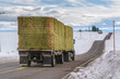 © ryan - Truck Hauling Load of Hay Bales