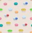 Seamless pattern with colorful bright pills and capsules.
