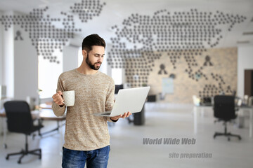 Male programmer with laptop and cup of coffee on color background