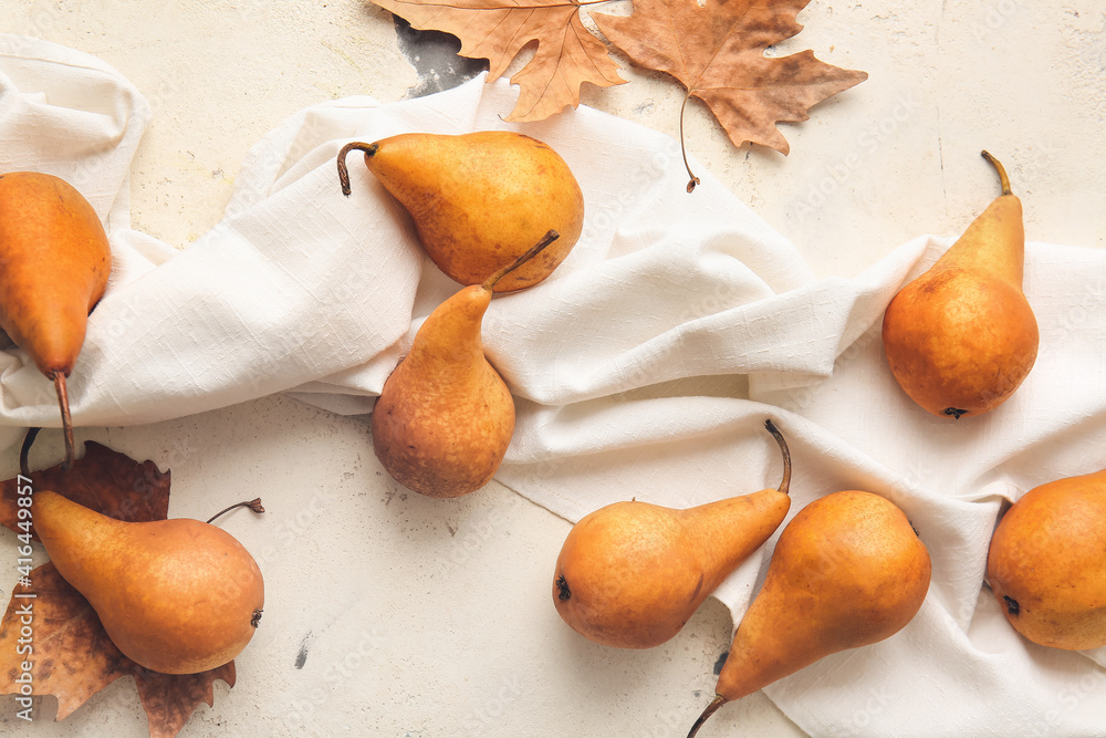 Fresh ripe pears on light background