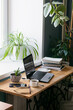 © ximich_natali - Workplace of man desk books laptop home interior. The concept of distance learning or online learning.