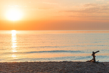 Wall Mural - scenic view of orange sunset on the sea landscape