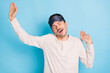© deagreez - Portrait of nice healthy sleepy guy wearing sleep mask stretching yawning awakening isolated over bright blue color background
