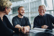 © Jacob Lund - Business people having meeting in office