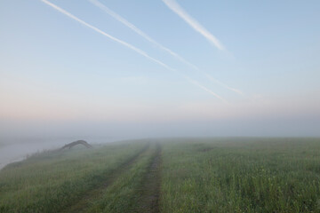  Sunrise on a meadow with fog