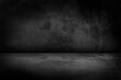© CravenA - Black, dark and gray abstract cement wall and studio room , interior texture for display products. Room black floor is made of dark plaster.