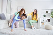 © deagreez - Photo portrait of daughter playing with dad sitting on his back at home on weekends