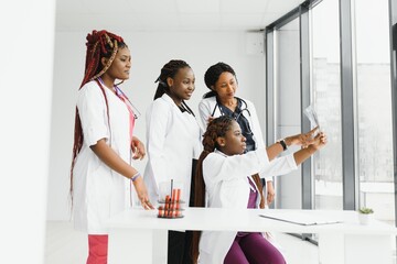 Wall Mural - group of african american doctor and nurse in hospital ward