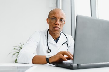 Wall Mural - african american doctor in modern office