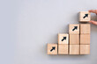 © Hazal - Business concept growth success process, Close up Woman hand arranging wood block stacking as step stair on grey background, copy space.