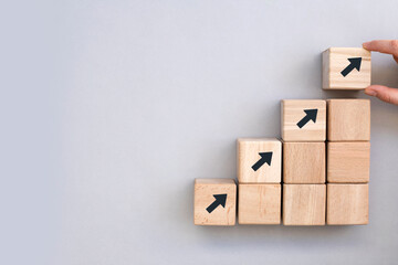 business concept growth success process, close up woman hand arranging wood block stacking as step s