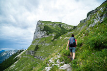 A Young Female Hiker Does Trail Hiking To The Top Of The Loser Mountain In The Styria Region In Austria.