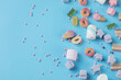 Jellybeans and marshmallow mix on a blue background