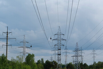 Power transmission towers and storm clouds