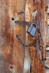 Closed door with two padlocks