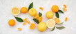 Tangerines and oranges: whole, cut and lobules with green leaves on white background. Prepare wonderful, fresh juice every day to promote health and replenish body with vitamins. Close-up.
