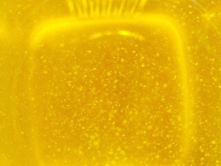 vegetable oil oil texture yellow background