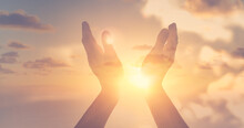 Worshiping Hands Up To The Sunset Sky. Positive Energy, Prayer And Gratitude Concept. 