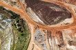 © AmazingAerialAgency - Aerial view of vehicles parked near an opencut mine in Lilydale, Victoria, Australia.