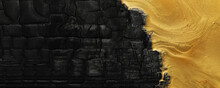 Abstract background of rough black charcoal with swirling gold paint and glitter. Bold contrast of black and gold colors.