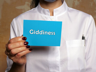 Wall Mural -  Giddiness phrase on the sheet.