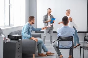 Poster - Business people giving presentation during meeting in office