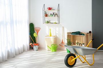 Wall Mural - Set of gardening supplies in barn