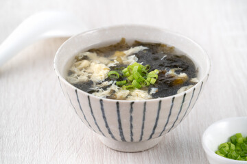 Wall Mural - Homemade delicious seaweed egg drop soup in a bowl.