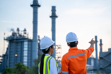 Aufkleber - Refinery industry engineer are working and discussing at front oil and gas industrial factory,Oil refinery plant for industry.