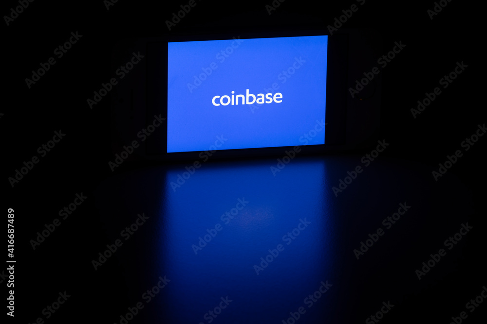 Portland, OR, USA - Feb 25, 2021: Coinbase logo is seen on a smartphone. Coinbase is a US digital currency exchange built on financial technology and based in San Francisco, California.
