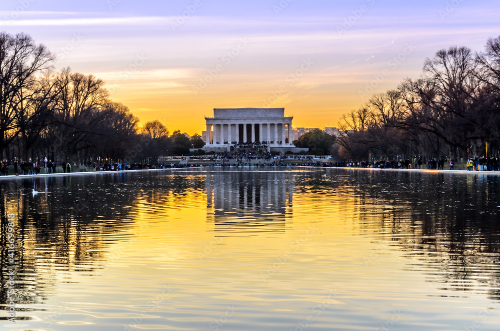 Lincoln Memorial and Reflecting Pool at Sunset in Washington DC, Beautiful Sky Colors. Bare Trees Across the Park	