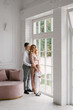 © ksyusha_yanovich - Beautiful young family man woman and son in smart clothes in a luxurious bright interior, happy family
