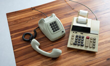 Old Fashioned Calculator And Telephone