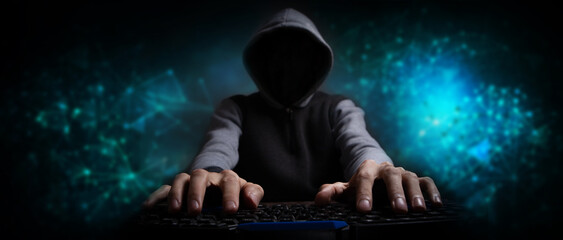 Cybersecurity, computer hacker with hoodie