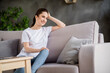 © deagreez - Photo of young happy cheerful smiling good mood businesswoman sit sofa having a break relaxing at home house