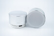 © Zkolra - New wireless grey no name mini speakers on white background