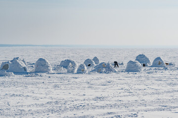 Wall Mural - Winter dwelling of Eskimos. Igloo. Eskimos village.