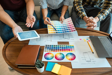 Wall Mural - team of creative web/graphic designer planning, drawing website ux app for mobile phone application 