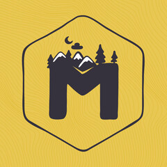 M letter logo with mountains peaks and trees on a landscape line pattern.