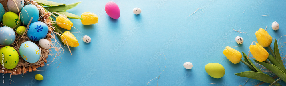 Easter Eggs And Flowers On A Blue Background - obrazy, fototapety, plakaty 