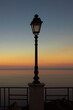 silhouette of a street lamp at sunset in Sicily