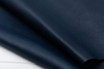 Natural folded dark blue cow leather	
