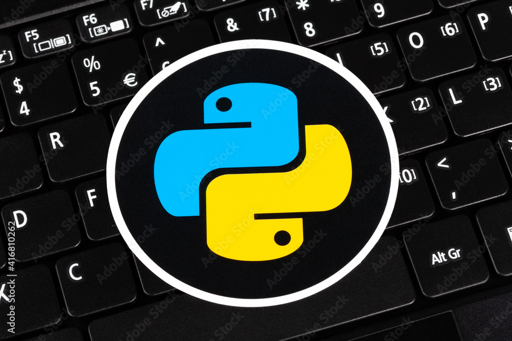 Python programming language round logo sticker, symbol label laying on ...