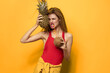 © SHOTPRIME STUDIO - woman with pineapple and coconut cocktail exotic fruits summer lifestyle yellow background
