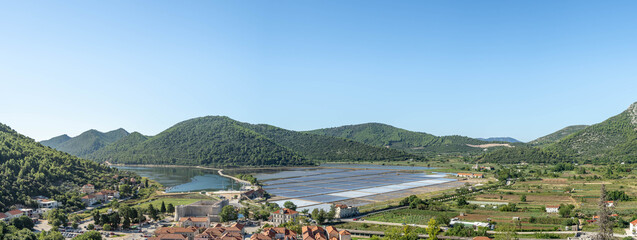 Wall Mural - Panoramic hill view of Salt Field outside Ston in southern Croatia summer